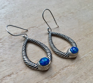 Opal dangly silver earrings Oval